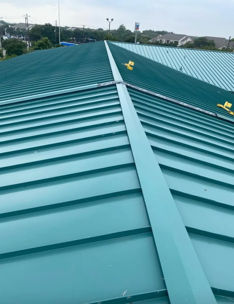 Green commercial metal roof ridge and valley for Metal Roof Repair in East Aurora